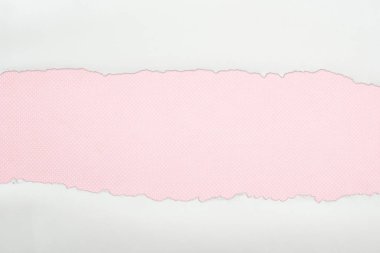 pembe arka planda kopya alanı ile düzensiz beyaz dokulu kağıt 