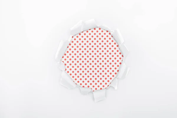 Ripped Hole Textured White Paper Red Polka Dot Background — Stock Photo, Image