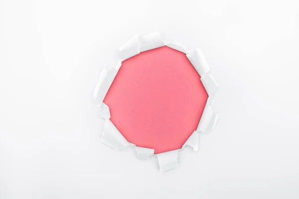 Ragged Hole White Textured Paper Pink Background — Stock Photo, Image