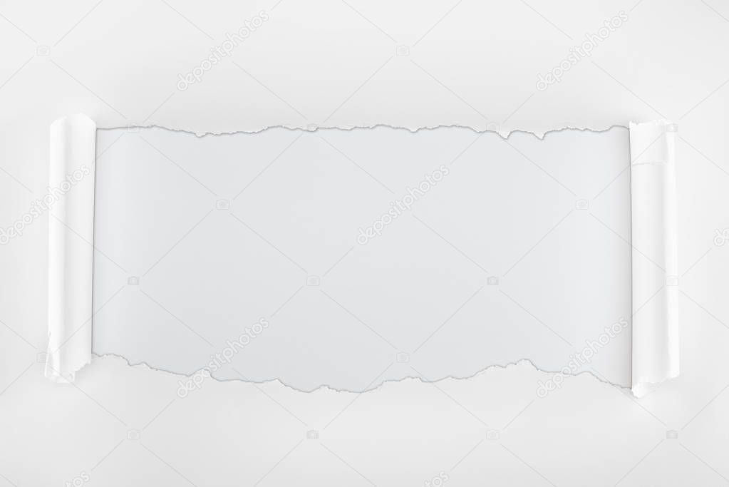 ragged textured paper with curl edges on white background 