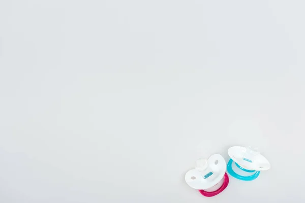 Top View Pink Blue Pacifiers Isolated White Copy Space — Stock Photo, Image