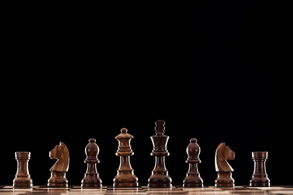 Wooden Chessboard Brown Chess Pieces Isolated Black — Stock Photo, Image