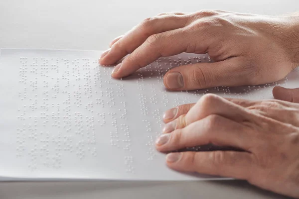 Cropped View Man Reading Braille Text Hands Isolated Grey — Stock Photo, Image