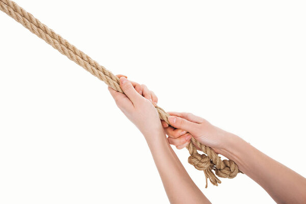 cropped view of woman holding jute ropes in hands isolated on white 