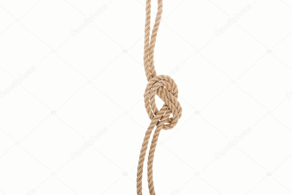 nautical brown ropes with sea knot isolated on white 