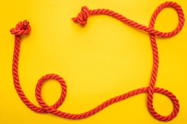 Curled Red Rope Twisted Knots Isolated Orange — Stock Photo, Image
