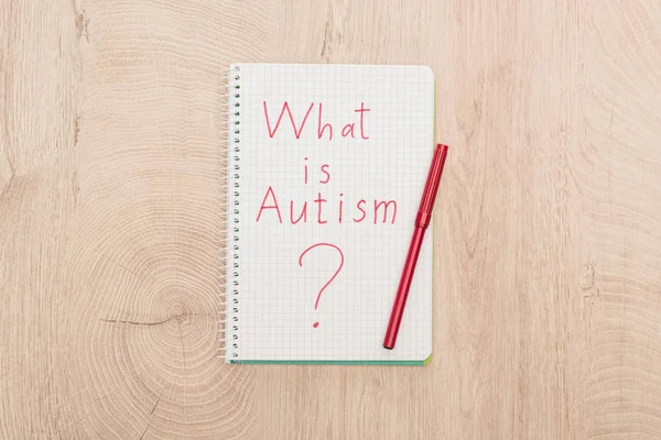 Top View Red Marker What Autism Question Written Notebook Wooden — Stock Photo, Image