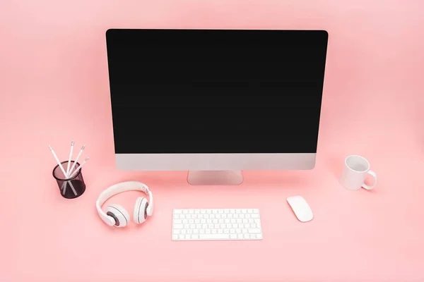 Workplace Computer Cup Headphones Stationery Pink Background — Stock Photo, Image