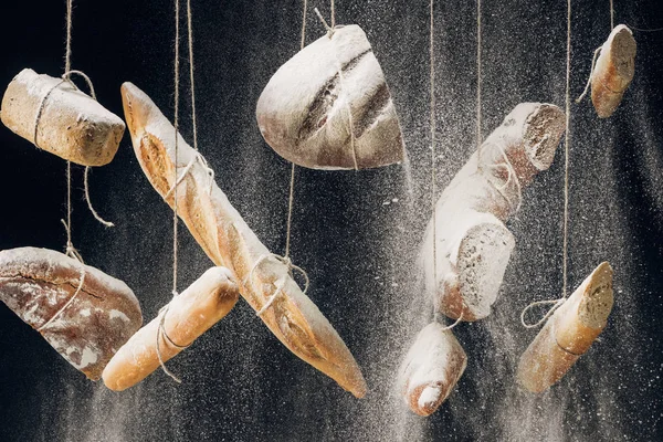 Flour Falling Fresh Baked Bread Baguettes Croissant Hanging Ropes Black — Stock Photo, Image