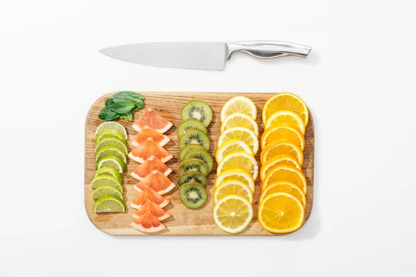 Top View Wooden Cutting Board Knife Cut Fruits White Surface — Stock Photo, Image