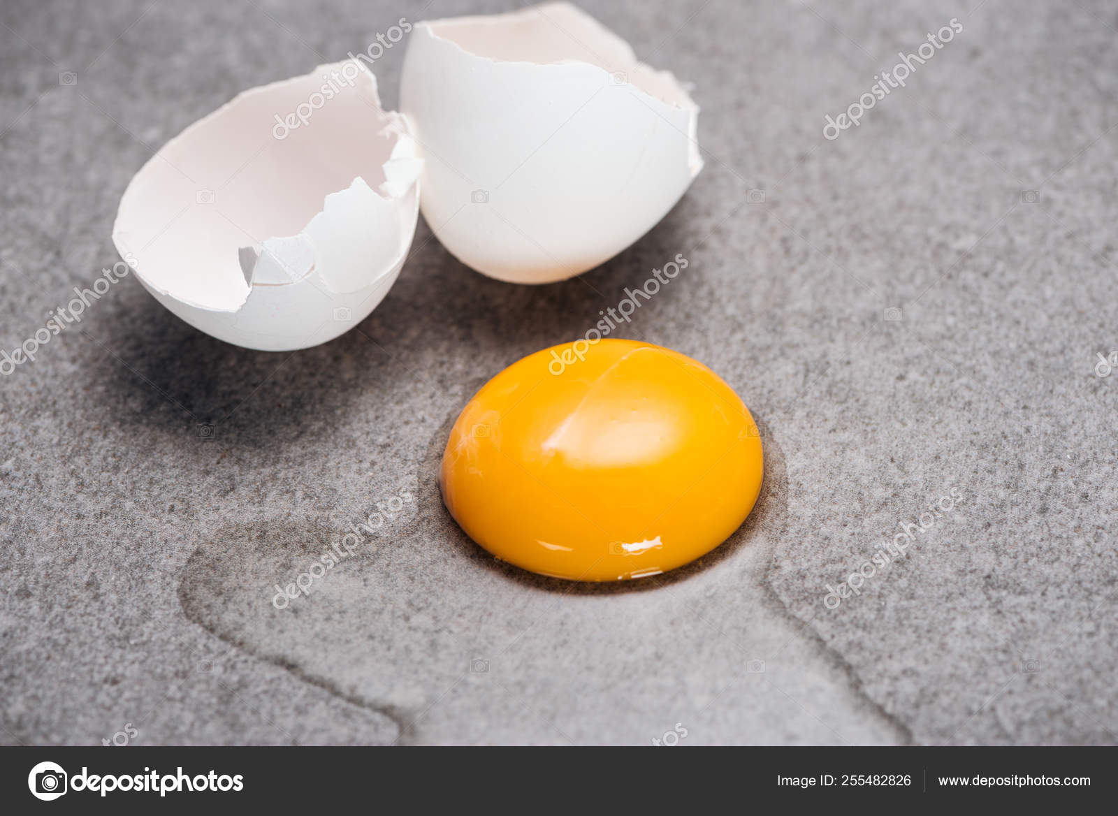 Close Raw Smashed Egg Yolk Protein Grey Textured Background Stock Photo by  ©VadimVasenin 255482826