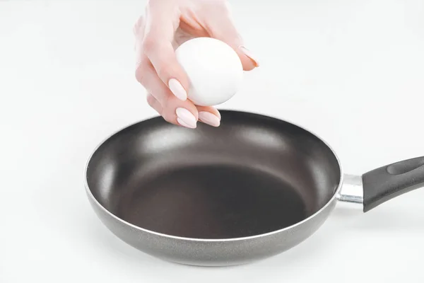 Cropped View Woman Holding Chicken Egg Pan White Background — Stock Photo, Image