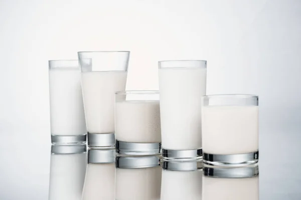 Row Glasses Fresh Alternative Milk Grey Background Reflection — Stock Photo, Image