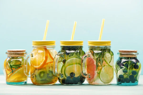 Fresh Detox Drinks Berries Fruits Vegetables Jars Straws Isolated Blue — Stock Photo, Image