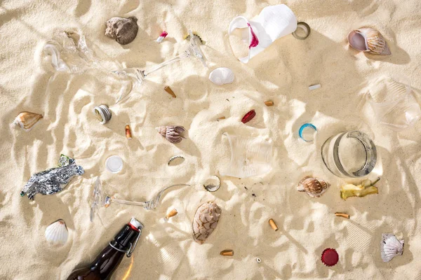 Top View Seashells Glass Bottle Scattered Cigarette Butts Broken Glasses — Stock Photo, Image