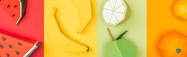 renkli çizgili kağıt üzerinde origami karpuz, muz, mandalina ve kireç panoramik çekim