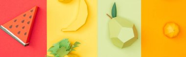 renkli kağıt şeritler üzerinde çeşitli el yapımı origami meyve panoramik çekim
