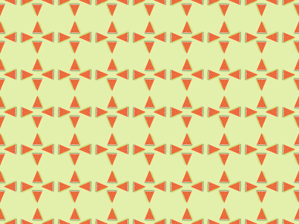 top view of pattern with handmade paper watermelon slices isolated on green