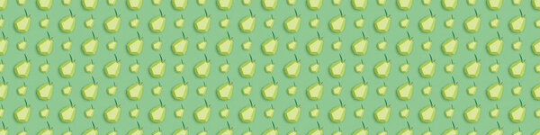 panoramic shot of pattern with handmade paper pears isolated on green