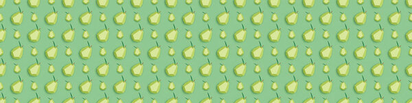 panoramic shot of pattern with handmade paper pears isolated on green