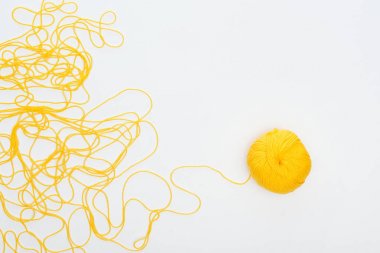 top view of knitting ball and yellow yarn Isolated On White  clipart