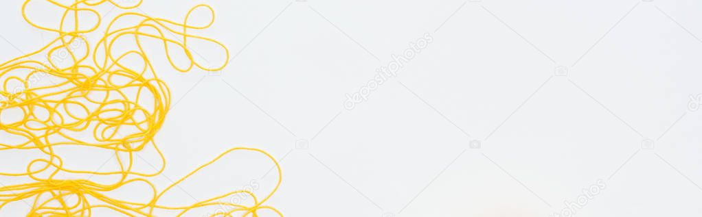 top view of yellow yarn with copy space Isolated On White 