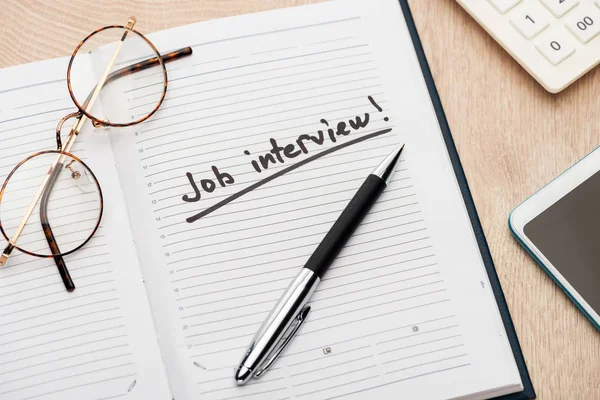 Notebook Pen Glasses Job Interview Lettering Wooden Table — Stock Photo, Image