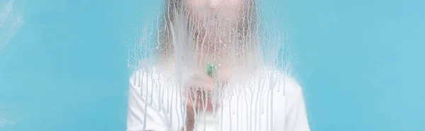 Panoramic Shot Young Woman Cleaning Glass Dripping Detergent Blue Background — Stock Photo, Image