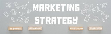 panoramic shot of marketing strategy inscription near wooden blocks with planning, management, website design, social media words and multimedia icons illustration on grey background, business concept clipart