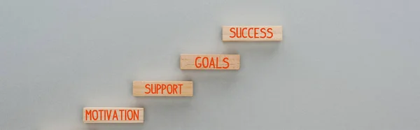 Panoramic Shot Wooden Blocks Motivation Support Goals Success Words Grey — Stock Photo, Image