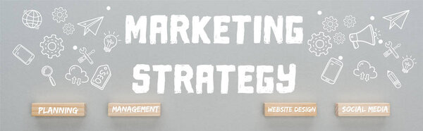 panoramic shot of marketing strategy inscription near wooden blocks with planning, management, website design, social media words and multimedia icons illustration on grey background, business concept