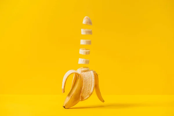 Raw Fresh Sliced Banana Isolated Yellow — Stock Photo, Image