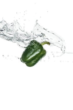 green whole bell pepper with clear water splash isolated on white clipart