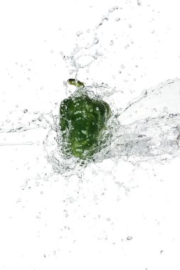 green bell pepper with clear water splash isolated on white clipart