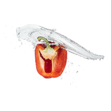 red bell pepper half with clear water stream isolated on white clipart