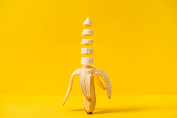Sliced nutritious tasty fresh banana isolated on yellow