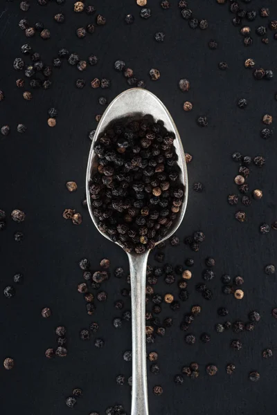 Top View Black Pepper Silver Spoon Black Background — Stock Photo, Image