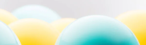 Panoramic Shot Blue Yellow Balloons Isolated Grey — Stock Photo, Image