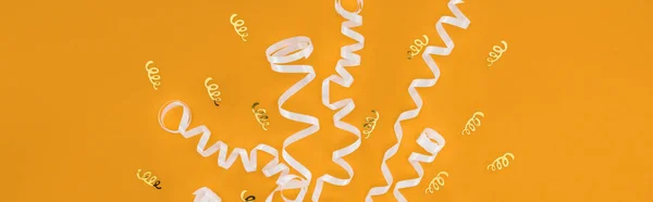 Panoramic Shot White Ribbons Orange Background Surprise Party Concept — Stock Photo, Image