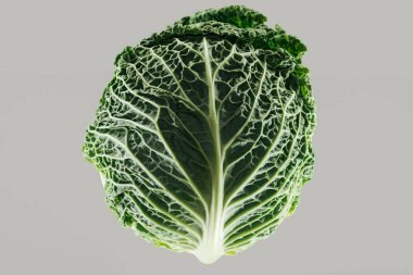 top view of green fresh organic whole cabbage isolated on grey clipart