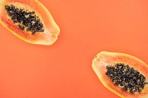 Top View Exotic Papaya Halves Black Seeds Isolated Orange — Stock Photo, Image