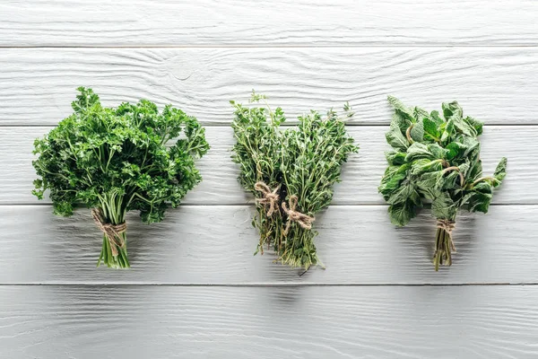 Top View Green Thyme Mint Parsley White Wooden Table — Stock Photo, Image