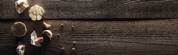 Panoramic Shot Garlic Cloves Black Pepper Wooden Table — Stock Photo, Image