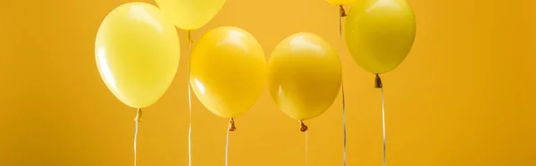 Party Bright Minimalistic Balloons Yellow Background Panoramic Shot — Stock Photo, Image