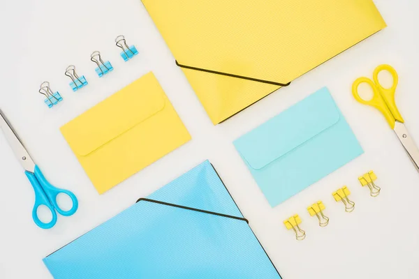 Top View Yellow Blue Envelopes Folders Paper Clips Scissors Isolated — Stock Photo, Image