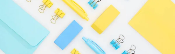 Panoramic Shot Yellow Blue Erasers Pens Envelopes Paper Clips Isolated — Stock Photo, Image