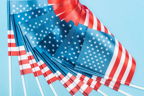 Close View Silk American Flags Sticks Blue Background — Stock Photo, Image