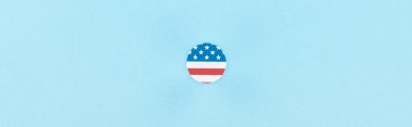 top view of paper cut decorative circle made of american flag on blue background, panoramic shot  clipart