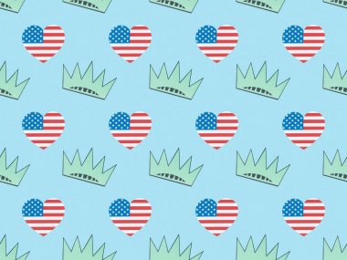 seamless background pattern with hearts made of usa flags and crowns on blue, Independence Day concept clipart