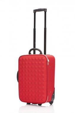 red wheeled colorful suitcase with handle isolated on white clipart